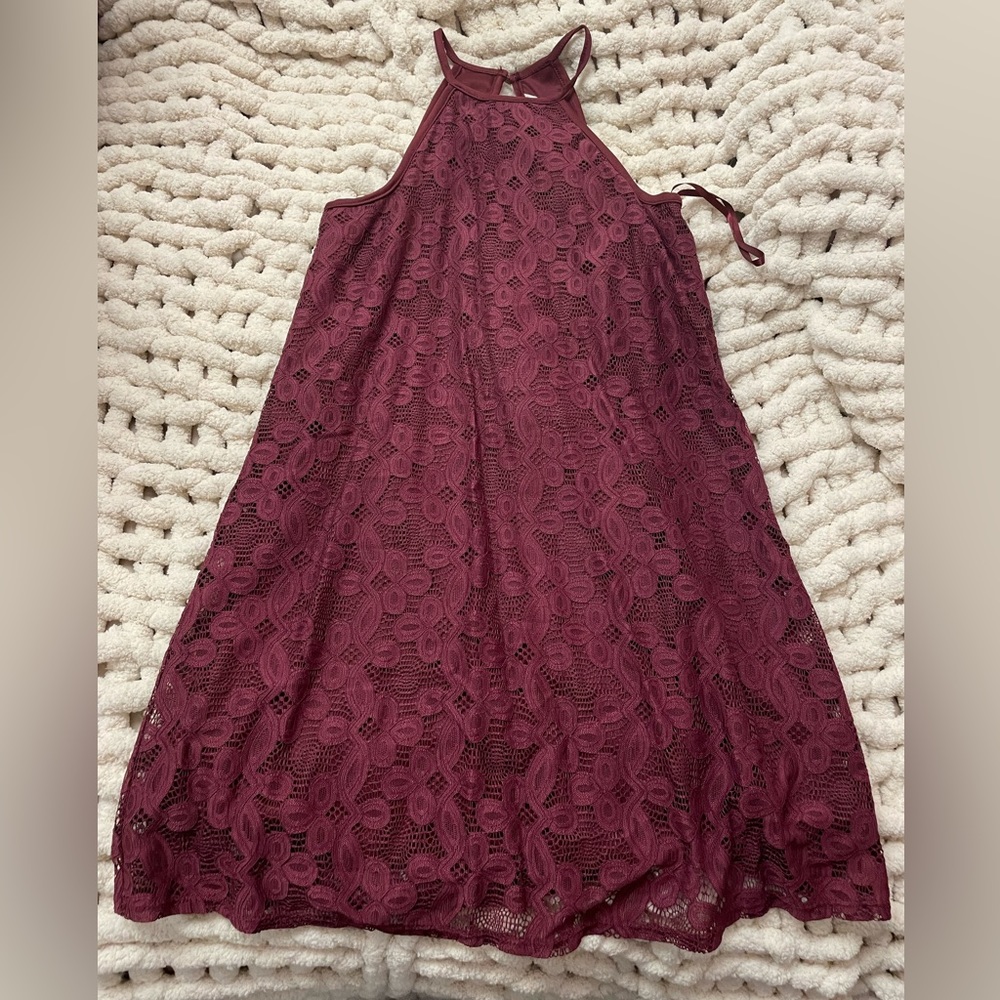 Francesca’s small burgundy high neck dress